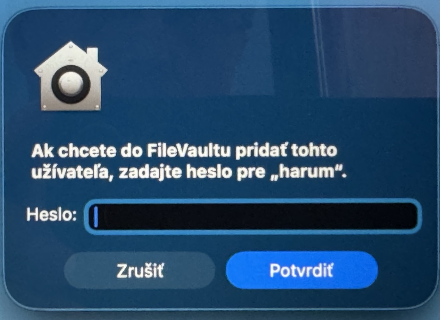 Výzva na zadanie hesla pre pridanie používateľa do FileVaultu